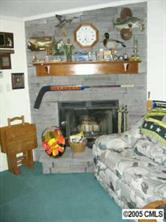 5151 Crouse Road Crouse, NC 28033 - Photo 7 of 8 a living room with furniture and a fireplace