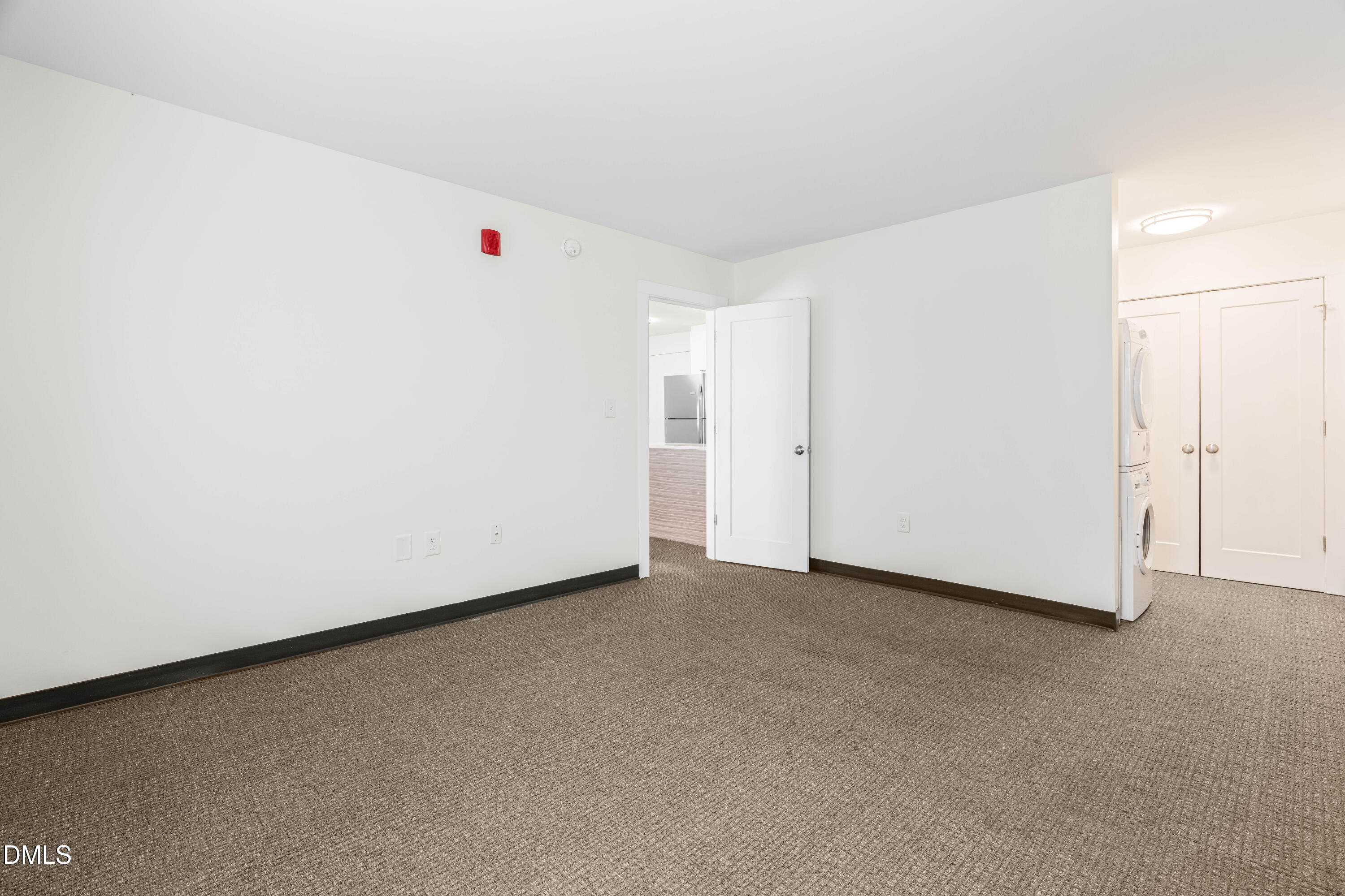 5104 Hollyridge Drive, Unit 303 Raleigh, NC 27612 - Photo 13 of 21 a view of an empty room