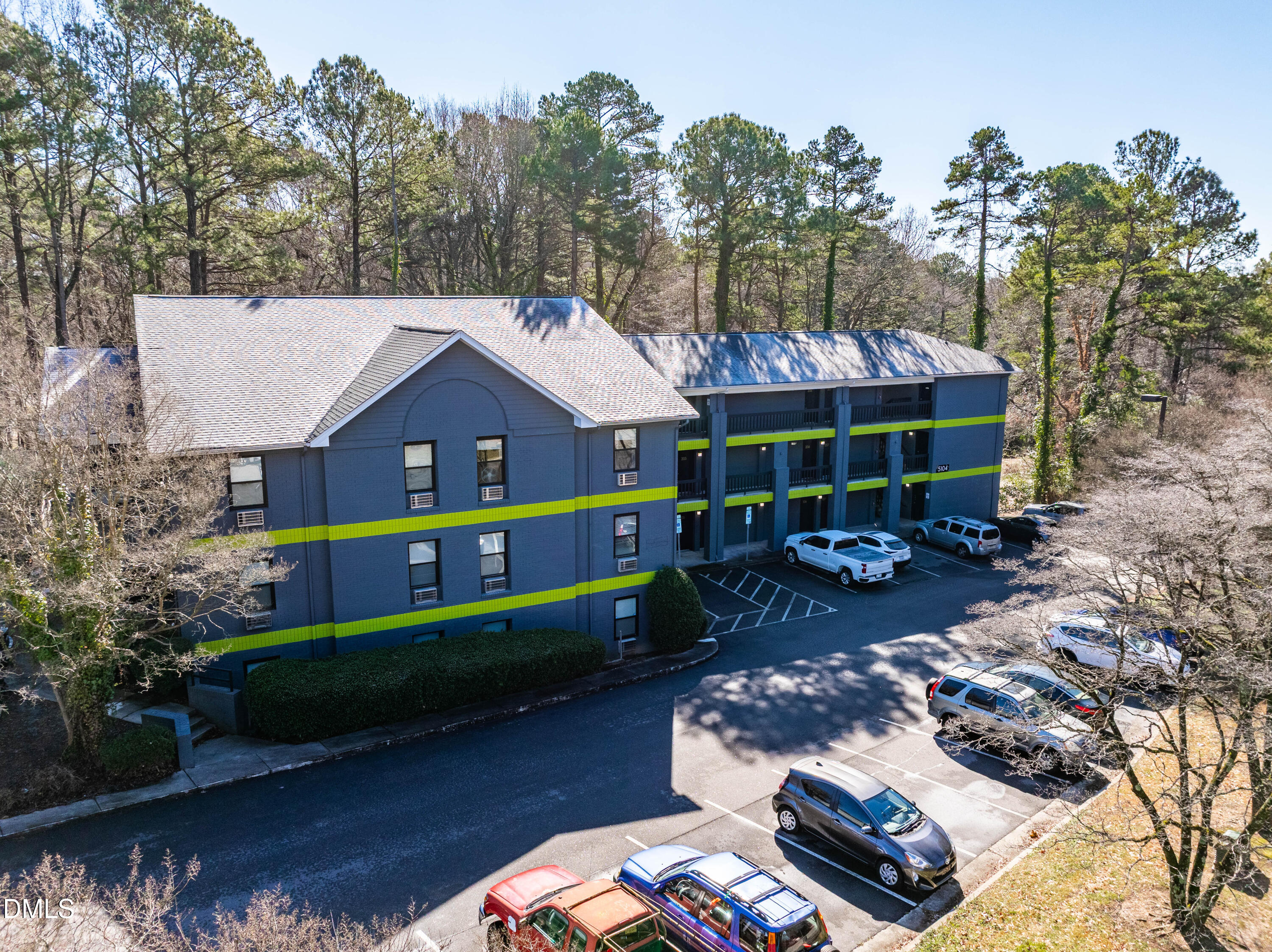 5104 Hollyridge Drive, Unit 303 Raleigh, NC 27612 - Photo 8 of 21 a view of house with outdoor space and sitting area