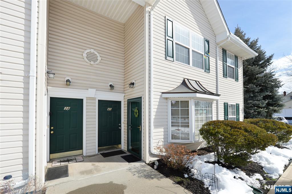 40 Chanda Court, Unit D040 Clifton, NJ 07012 - Photo 3 of 17 a view of a house with a yard