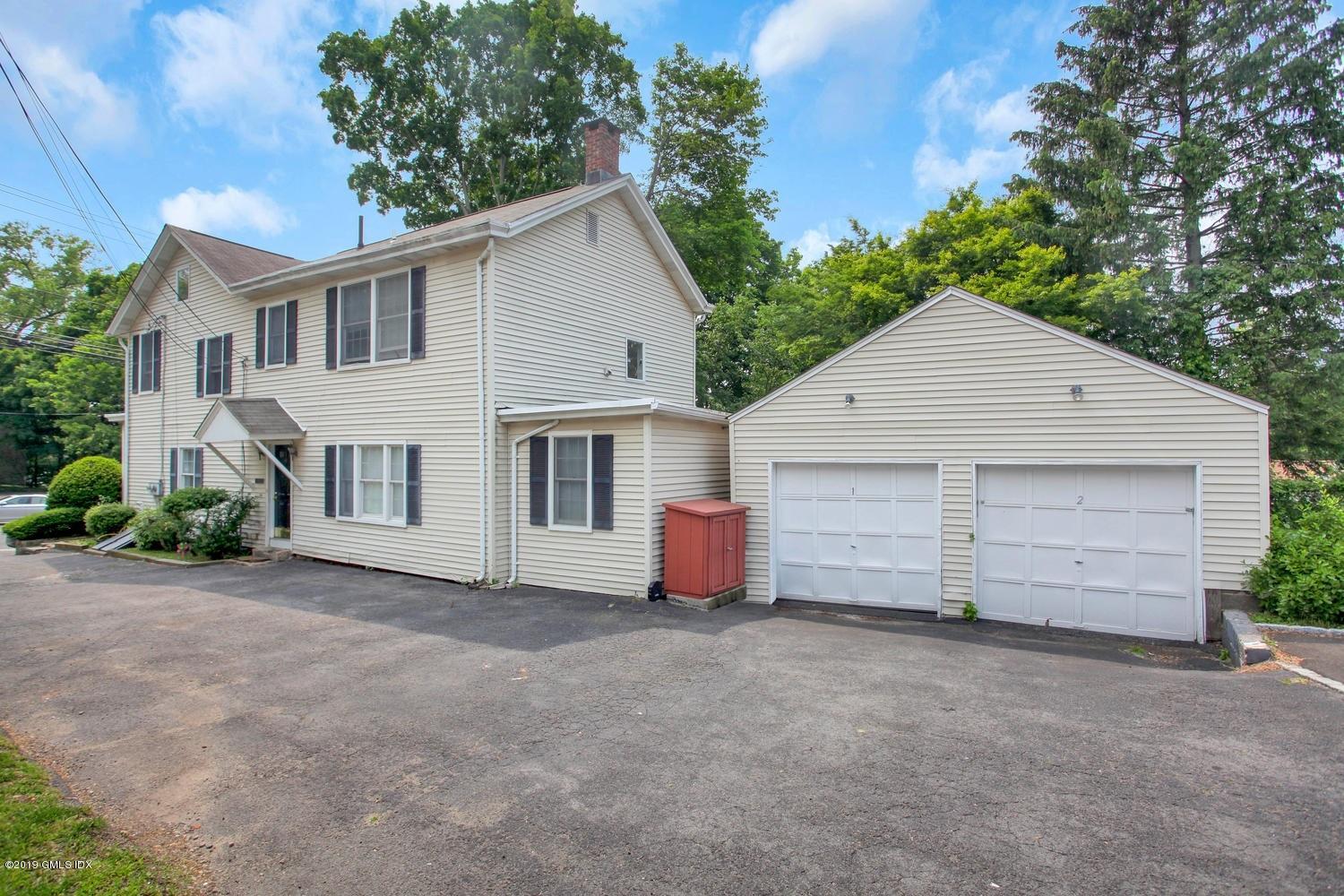 1033 East Putnam Avenue Riverside, CT 06878 - Photo 2 of 14 1033 E Putnam Ave Riverside CT-large-014
