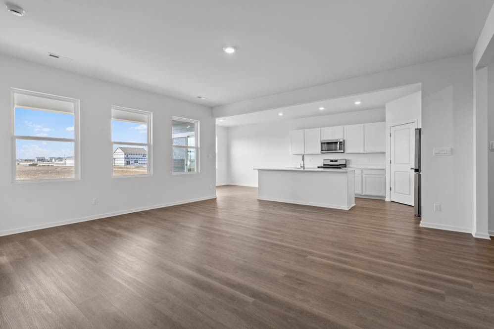 315 Snowdrop Lane Elgin, IL 60124 - Photo 37 of 46 a view of a kitchen with wooden floor and a window