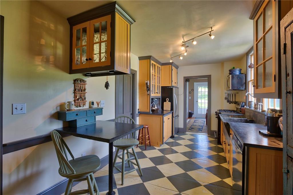19 Robinson Road Newcastle, ME 04553 - Photo 14 of 35 Breakfast area, door to left leading...