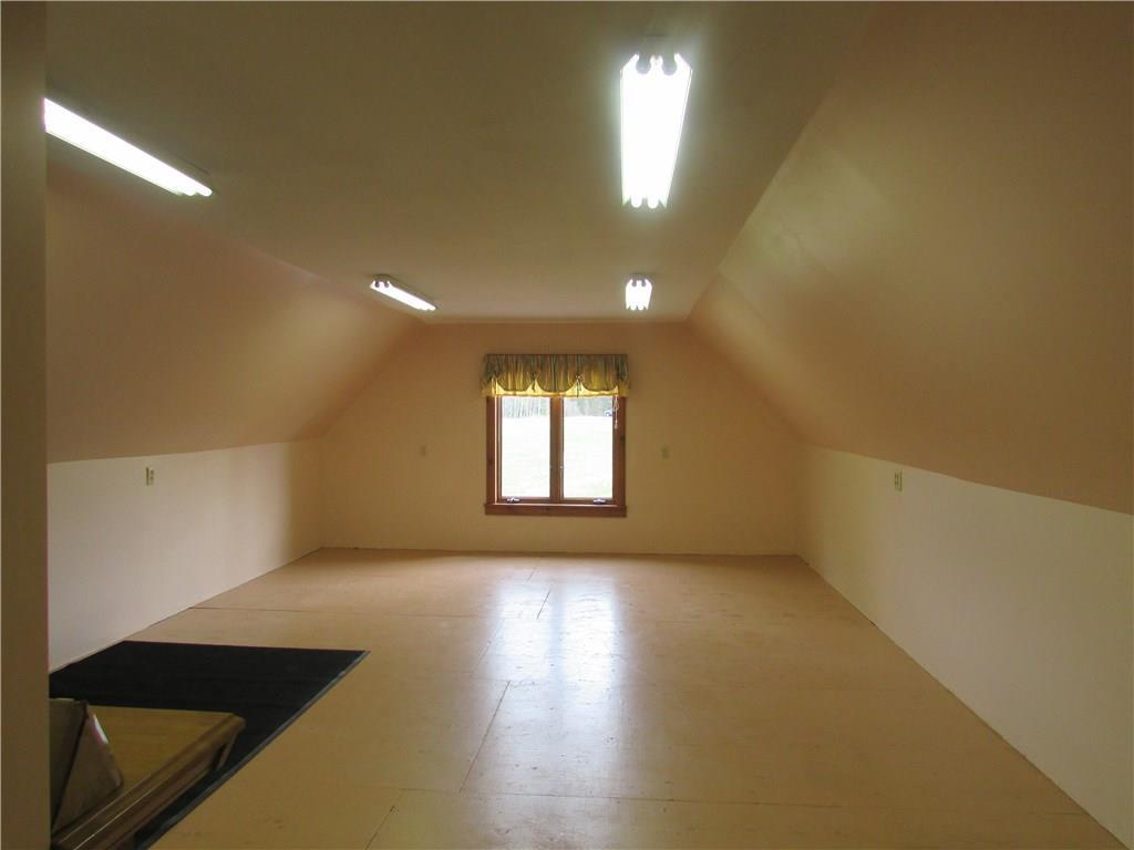 634 Sandy River Road Starks, ME 04911 - Photo 19 of 35 Great rec room, bunkroom or space...