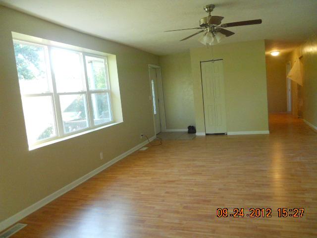 10784 Spence Road Bon Aqua, TN 37025 - Photo 8 of 20 LARGE LIVING ROOM HAS NEW WINDOWS AND FLOORS