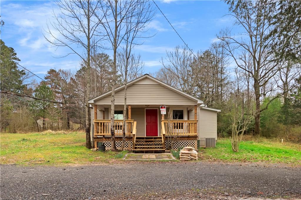 315 Highway 411 Ranger, GA 30734 - Photo 1 of 1 a view of a house with backyard and a tree