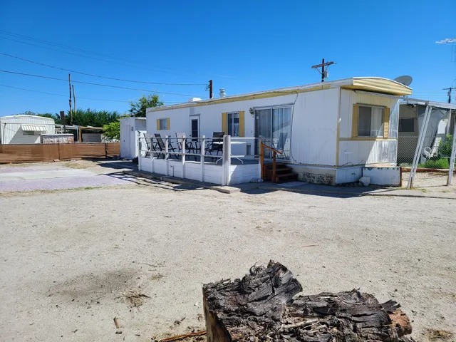a view of a house with a patio