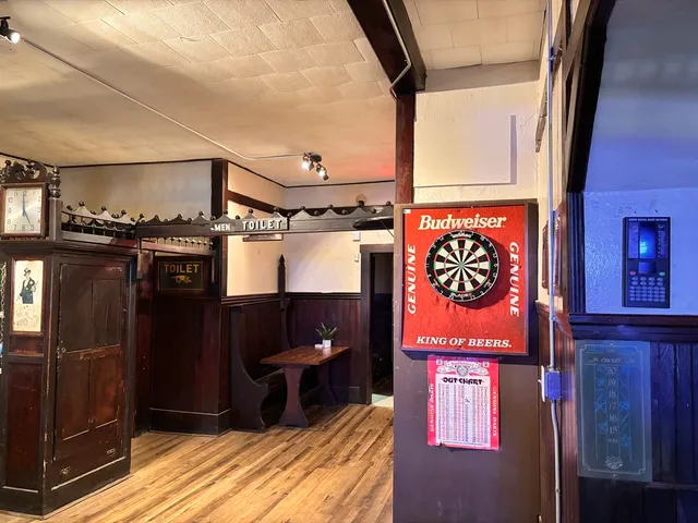 a view of a street with sitting area