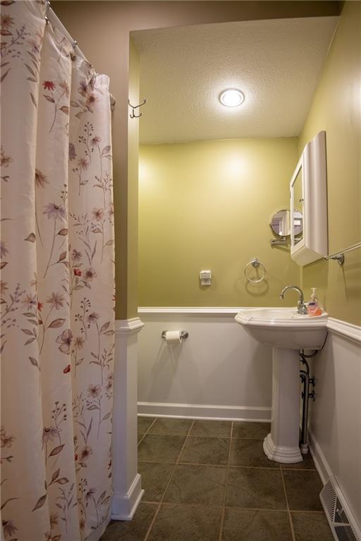 2634 Lake Road Clark, PA 16150 - Photo 12 of 25 Main level ; full bath with walk in shower.