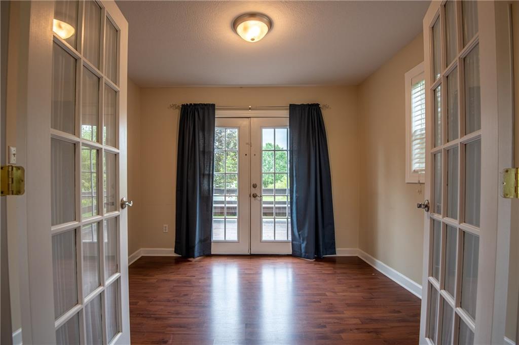 2634 Lake Road Clark, PA 16150 - Photo 9 of 25 Additional room could make a great office, den, or playroom. Opens to the deck with french doors.
