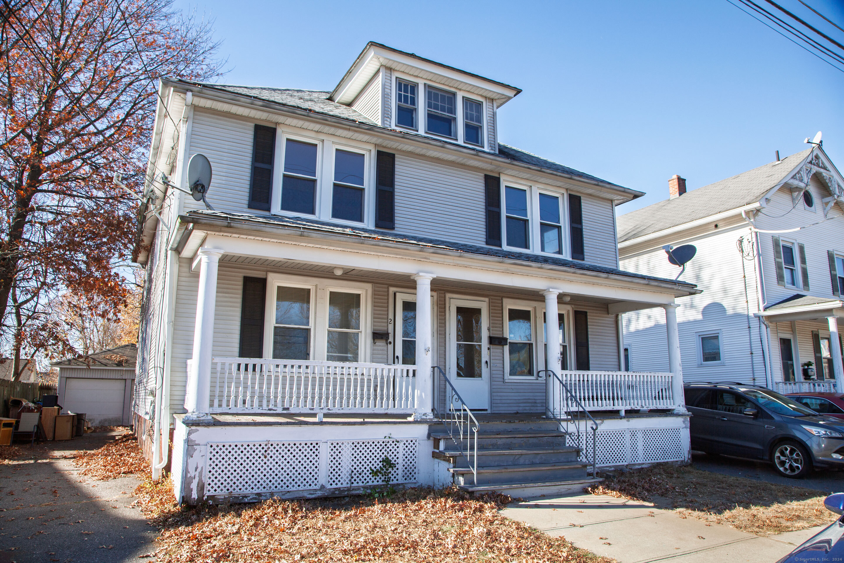 2 Chestnut Street Windsor Locks, CT 06096 - Photo 1 of 1 a front view of a house with a yard