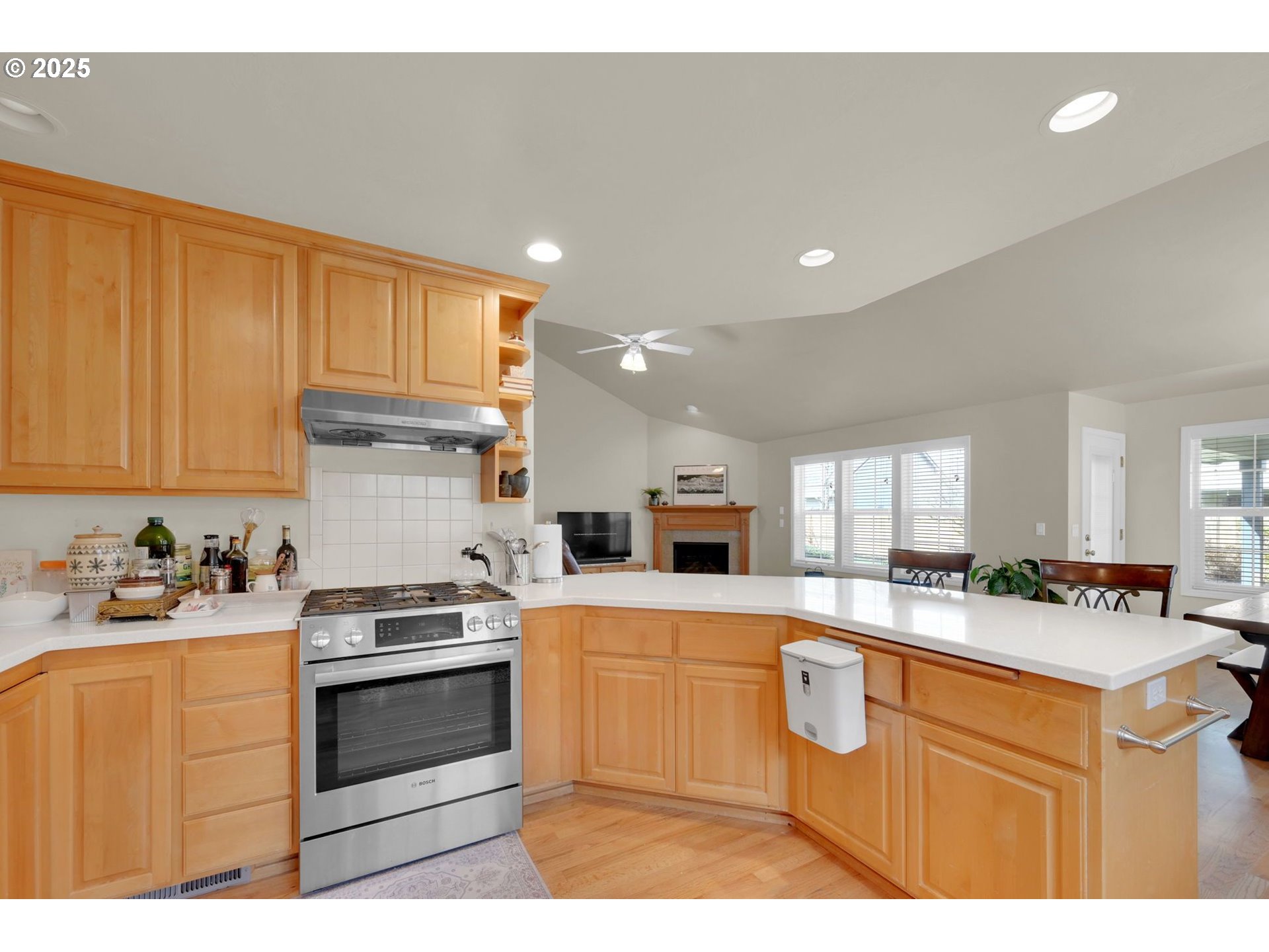 832 Mint Meadow Way Springfield, OR 97477 - Photo 11 of 31 a kitchen with granite countertop a sink stainless steel appliances and cabinets