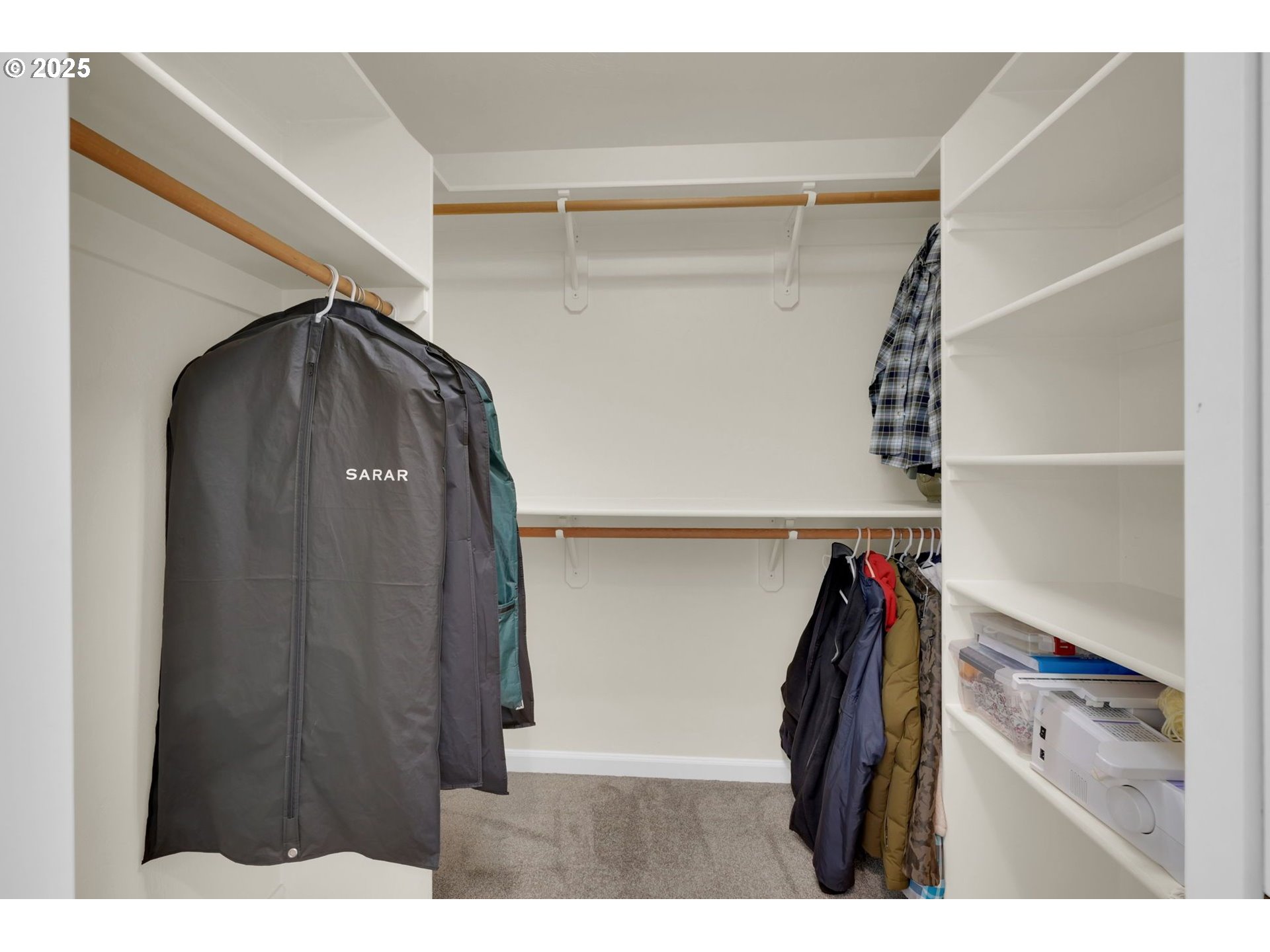 832 Mint Meadow Way Springfield, OR 97477 - Photo 17 of 31 a view of walk in closet with clothes and shoes