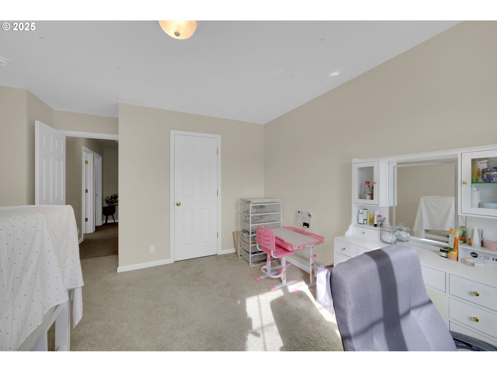 832 Mint Meadow Way Springfield, OR 97477 - Photo 21 of 31 a bedroom with furniture and a dresser
