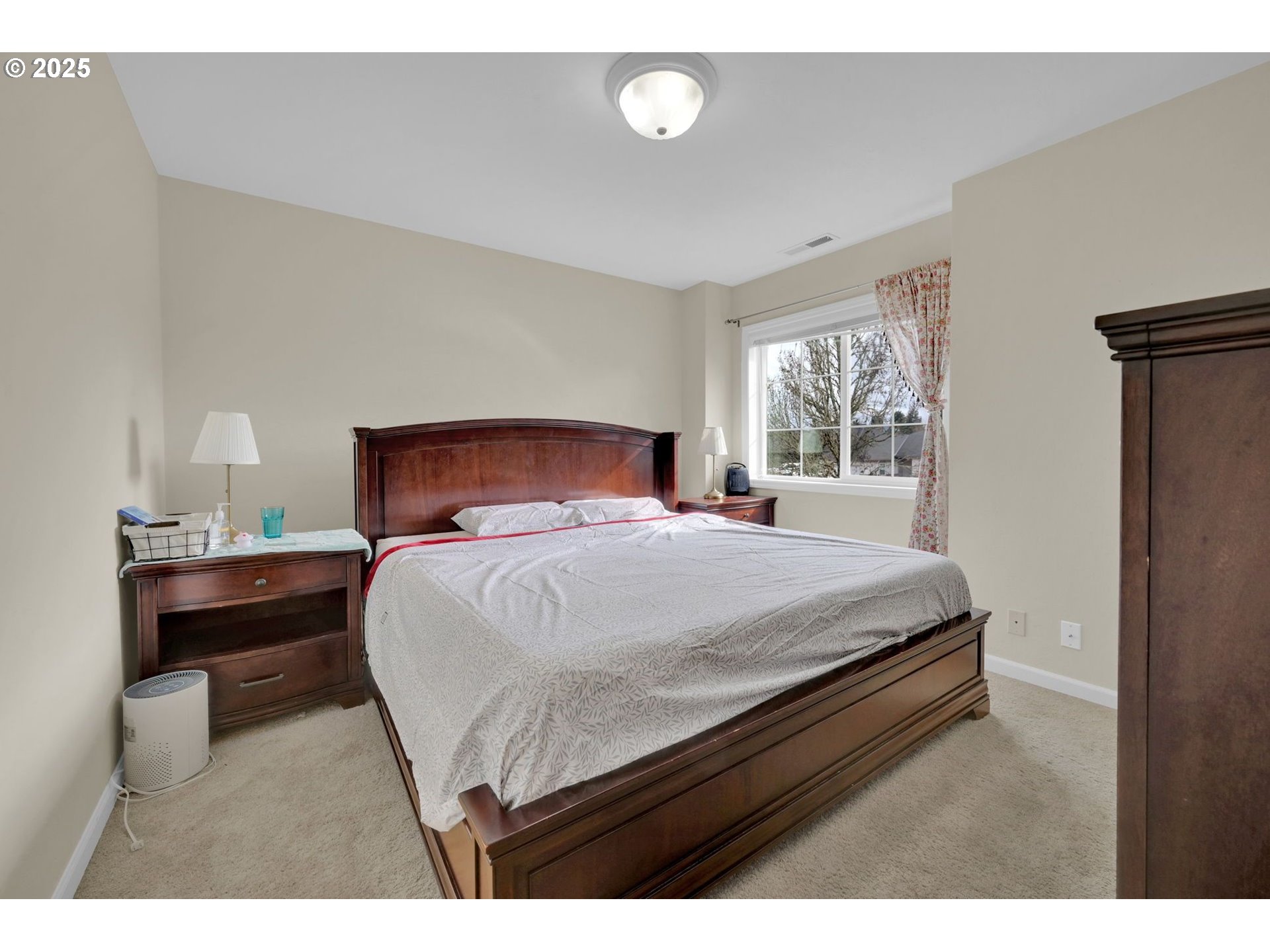 832 Mint Meadow Way Springfield, OR 97477 - Photo 24 of 31 a bedroom with a bed and a night stand