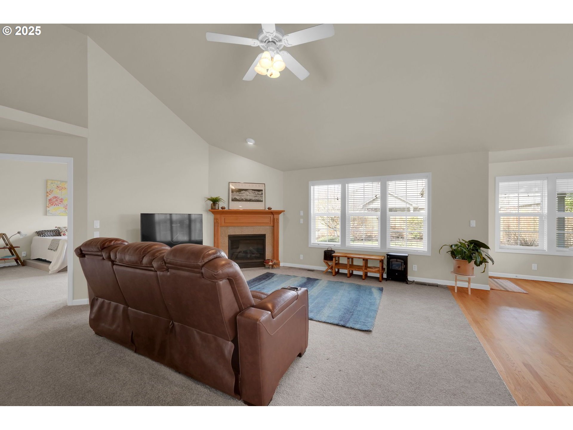 832 Mint Meadow Way Springfield, OR 97477 - Photo 7 of 31 a living room with furniture and a fireplace
