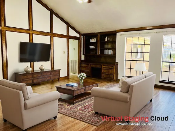 a living room with fireplace furniture and a flat screen tv