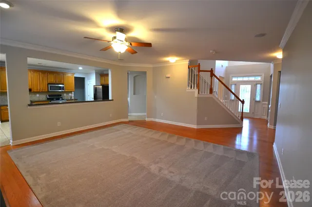 a view of a livingroom with a staircase