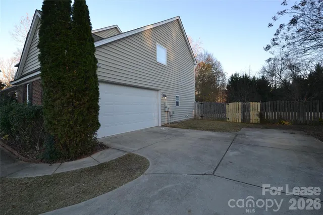 a view of backyard with green space