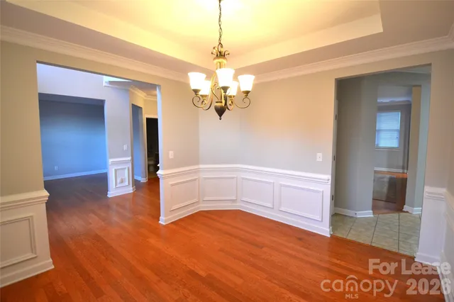 a view of a livingroom with wooden floor