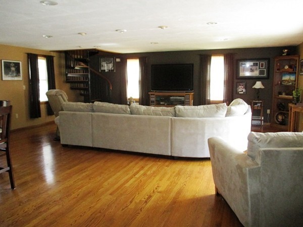 144 Shadow Lake Road Salem, NH 03079 - Photo 5 of 19 a living room with furniture and a flat screen tv