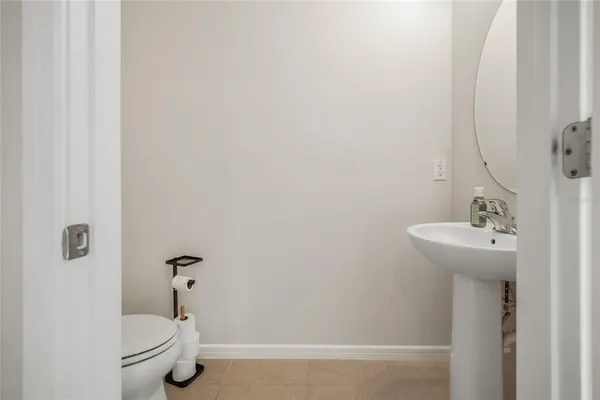 a bathroom with a sink and toilet