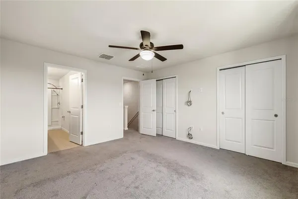 a view of a livingroom with a ceiling fan