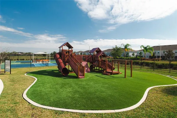 a view of a park with swings