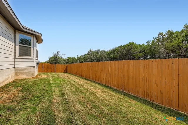 a view of outdoor space and yard