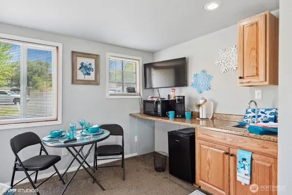 a view of a living room and dining room