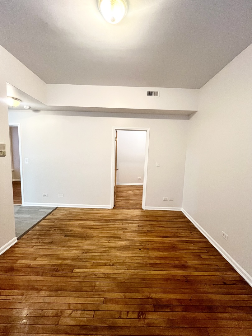 3227 South Carpenter Street, Unit 1M Chicago, IL 60608 - Photo 14 of 14 a view of an empty room