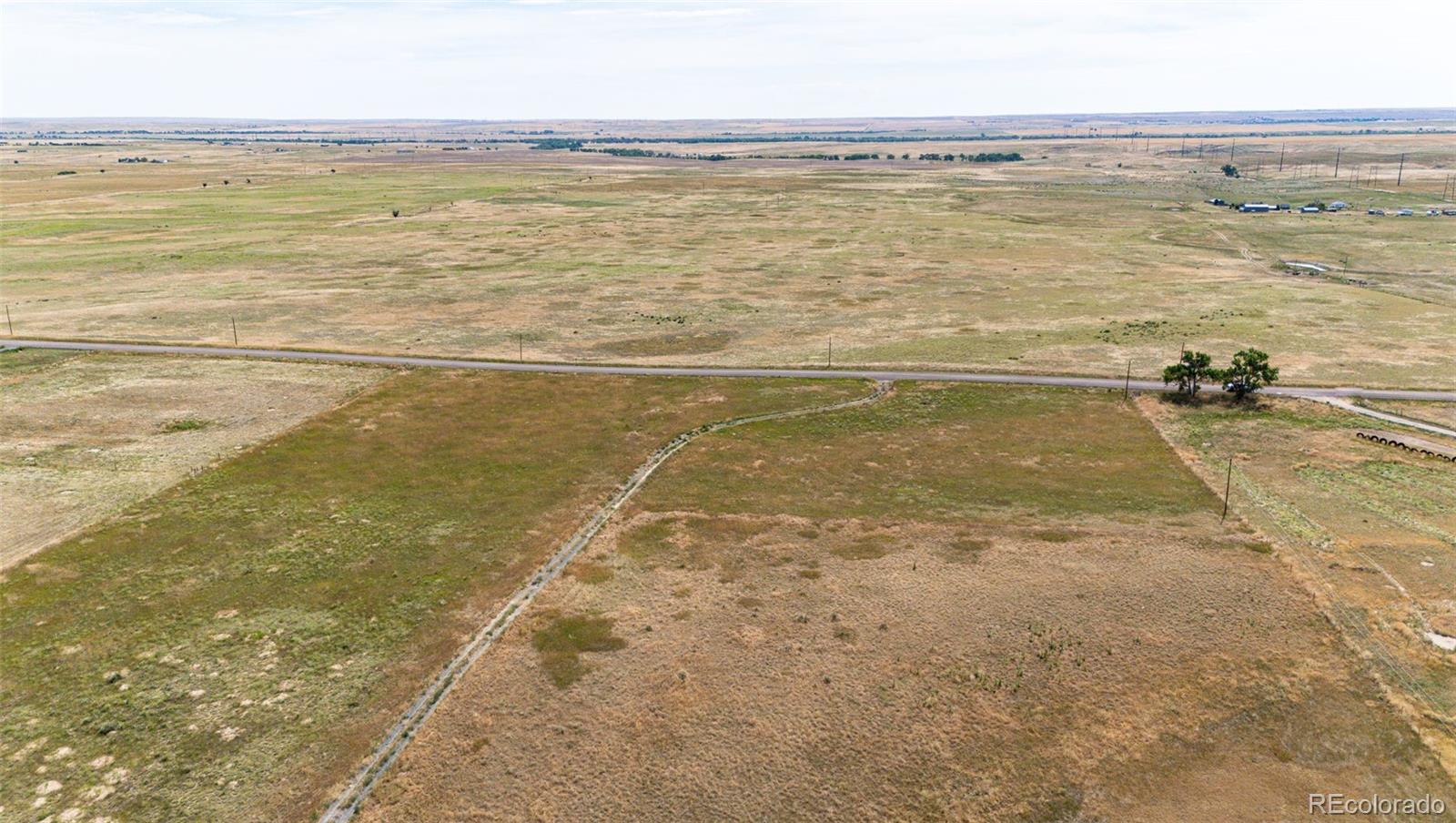 4055 South Co Road 193 Byers, CO 80103 - Photo 5 of 10 a view of an ocean and beach