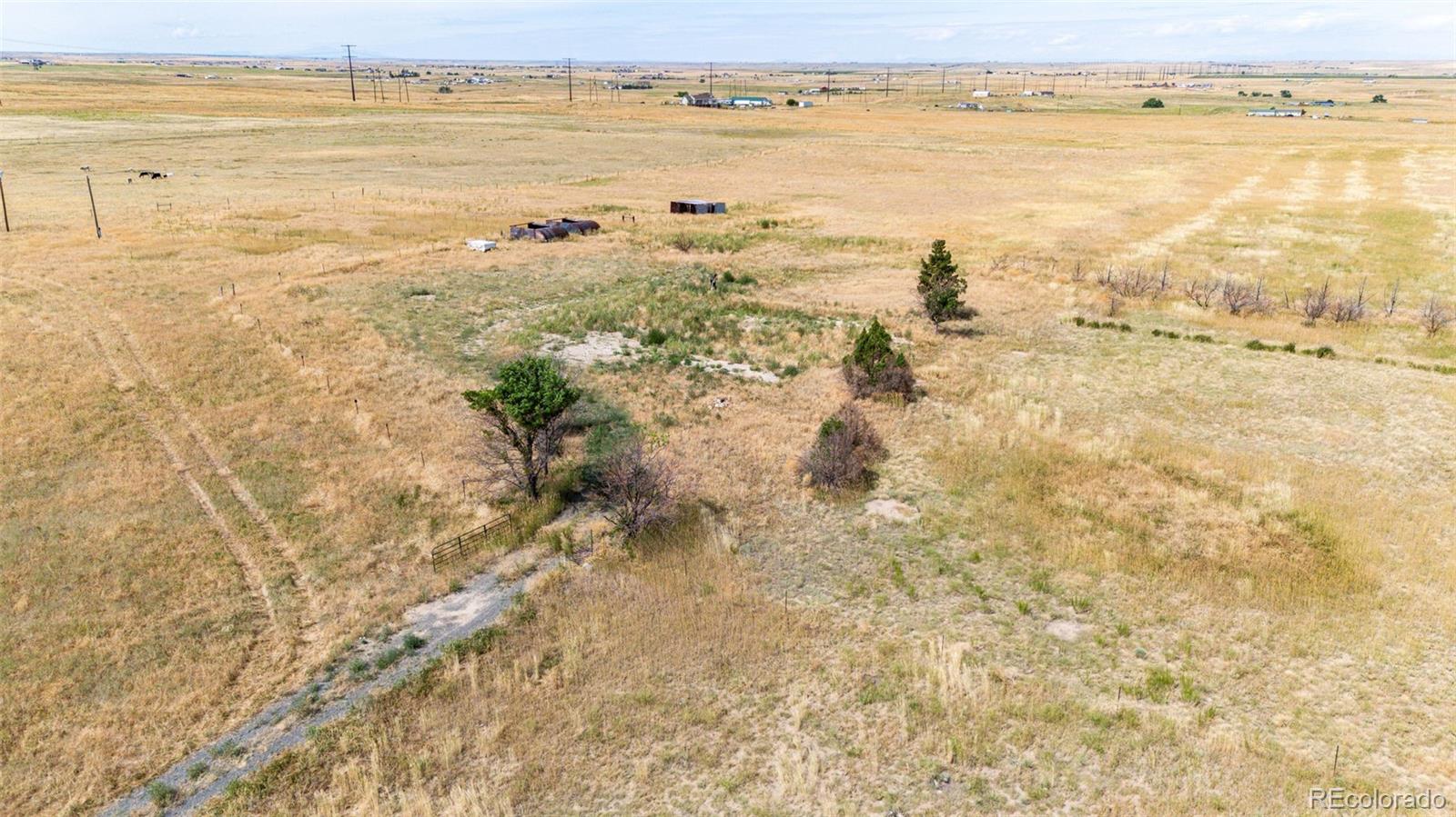 4055 South Co Road 193 Byers, CO 80103 - Photo 7 of 10 a view of an ocean and beach