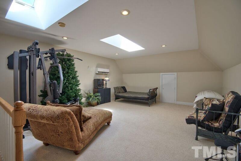 8306 Ball Road Bahama, NC 27503 - Photo 16 of 21 Second Floor Bonus Room with skylights