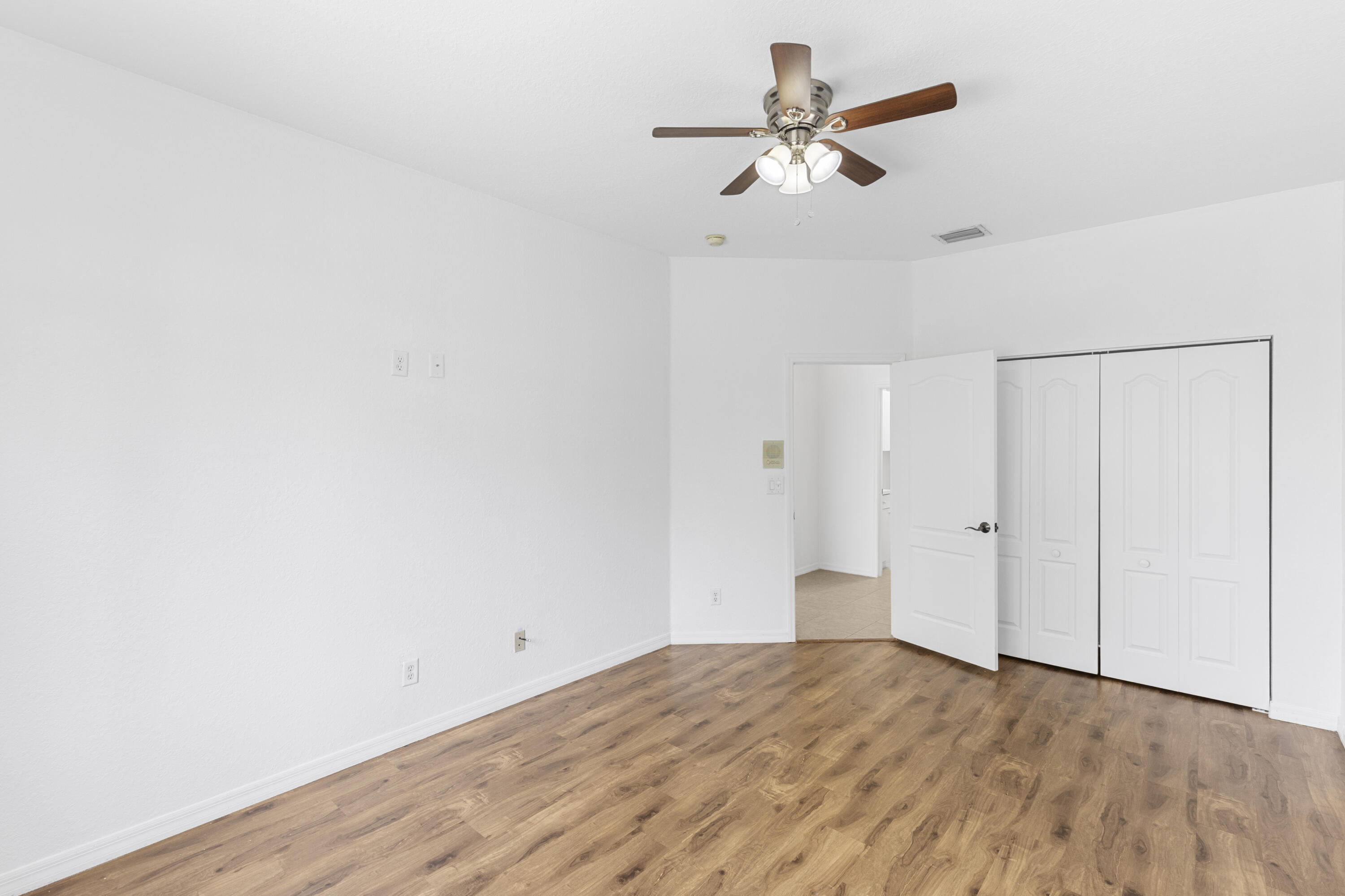 19389 Southwest 64th Street Pembroke Pines, FL 33332 - Photo 13 of 61 a view of empty room with wooden floor
