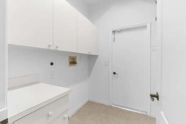 a bathroom with a toilet and a bathtub