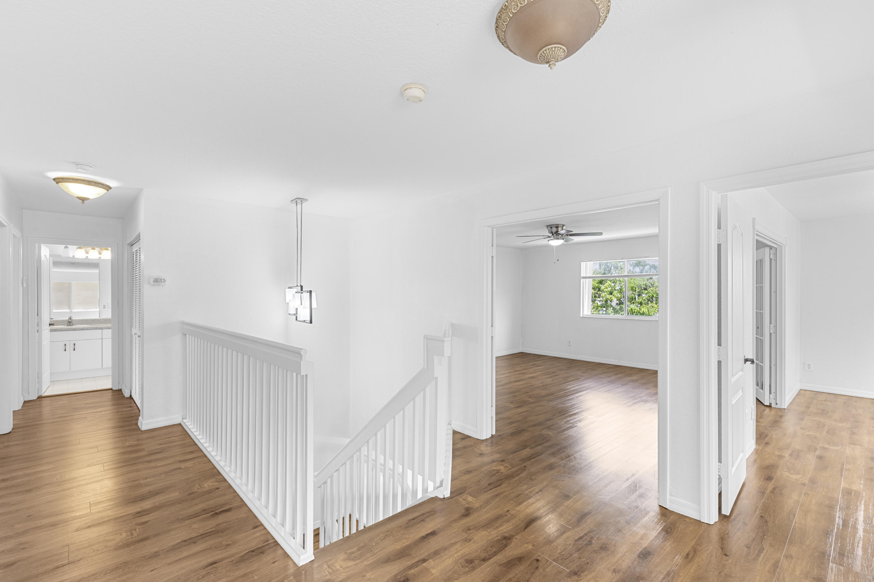 19389 Southwest 64th Street Pembroke Pines, FL 33332 - Photo 19 of 61 a view of hallway with wooden floor