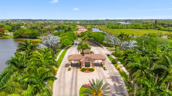 an aerial view of houses with yard