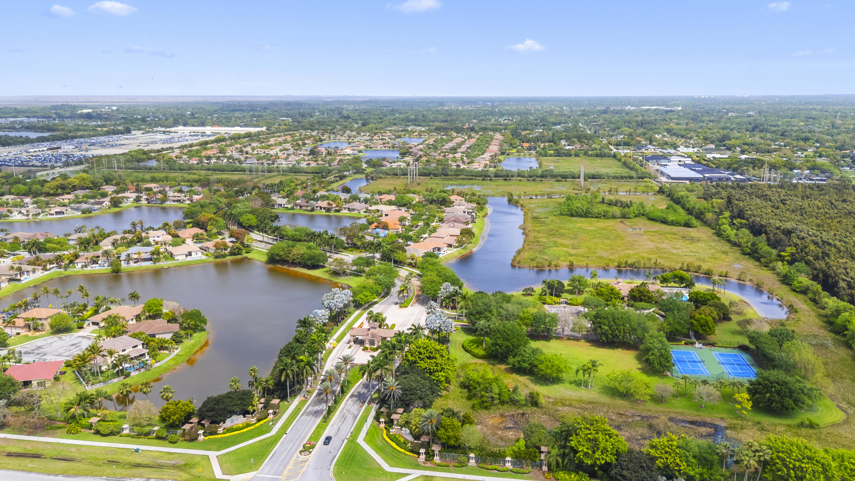 19389 Southwest 64th Street Pembroke Pines, FL 33332 - Photo 55 of 61 an aerial view of residential houses with outdoor space and lake view