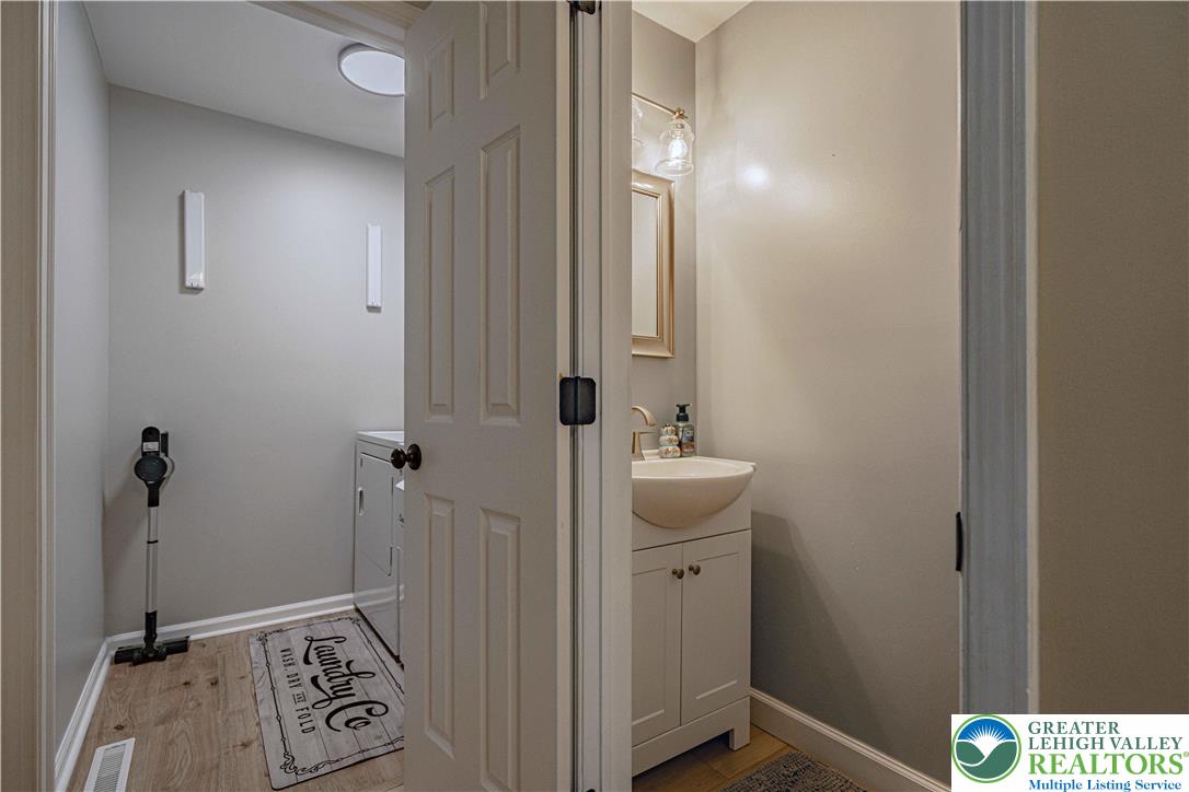 2389 Juniper Drive Coplay, PA 18037 - Photo 19 of 46 a bathroom with a sink and mirror