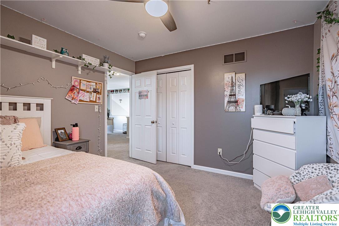 2389 Juniper Drive Coplay, PA 18037 - Photo 29 of 46 a bedroom with a bed and a dresser