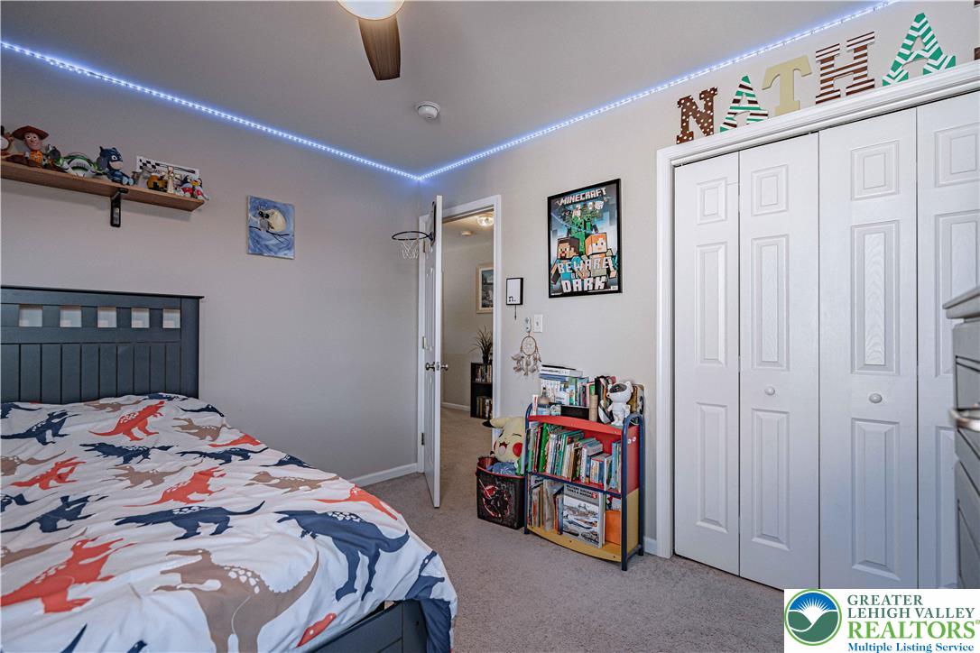 2389 Juniper Drive Coplay, PA 18037 - Photo 32 of 46 a bedroom that has a bed and a dresser in it