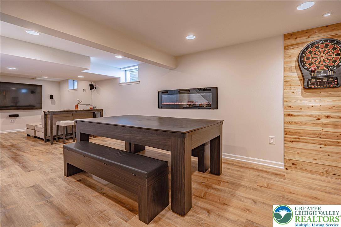 2389 Juniper Drive Coplay, PA 18037 - Photo 33 of 46 a living room with furniture and a flat screen tv