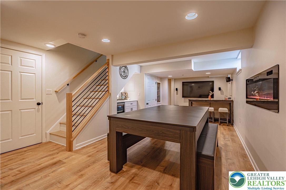 2389 Juniper Drive Coplay, PA 18037 - Photo 34 of 46 a room with lots of wooden furniture and windows