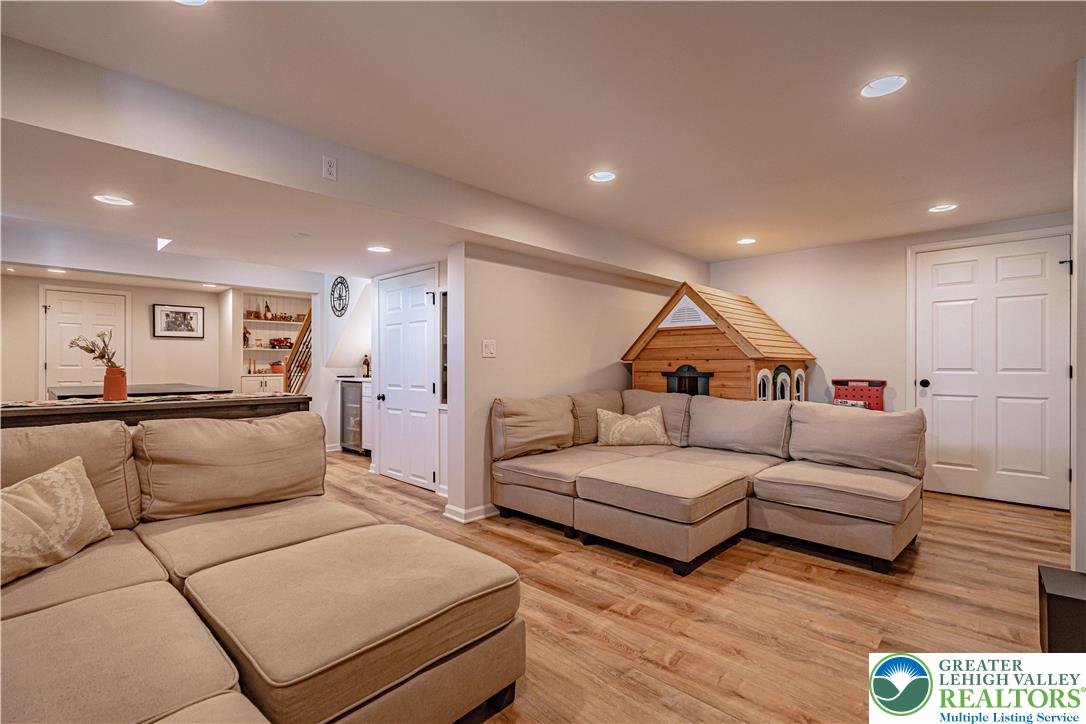 2389 Juniper Drive Coplay, PA 18037 - Photo 39 of 46 a living room with furniture and a lamp