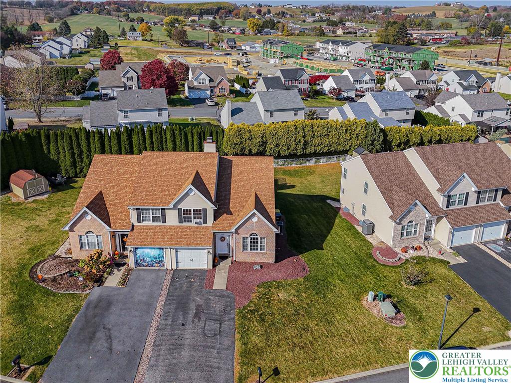 2389 Juniper Drive Coplay, PA 18037 - Photo 4 of 46 an aerial view of residential houses with outdoor space and parking