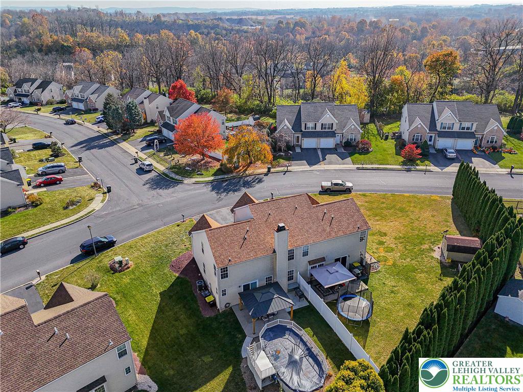 2389 Juniper Drive Coplay, PA 18037 - Photo 45 of 46 an aerial view of a house with a swimming pool patio and outdoor seating