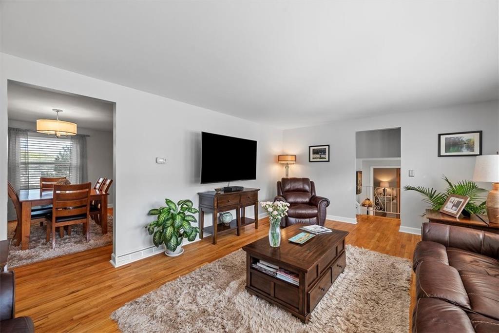 505 Hudderford Road Pittsburgh, PA 15237 - Photo 14 of 43 a living room with furniture and a flat screen tv