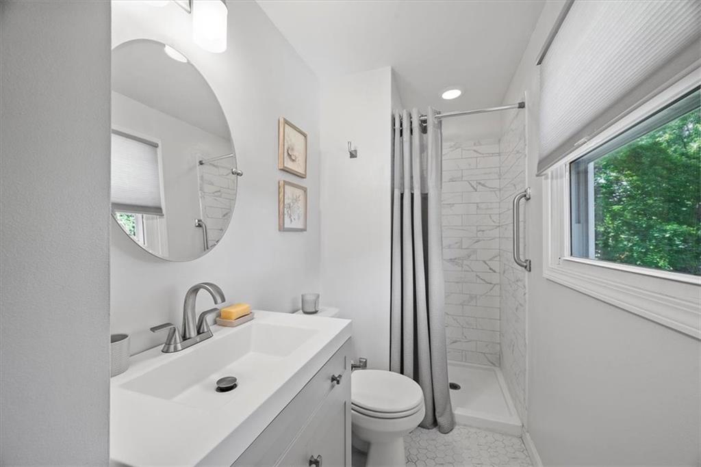505 Hudderford Road Pittsburgh, PA 15237 - Photo 23 of 43 a bathroom with a sink toilet and a mirror