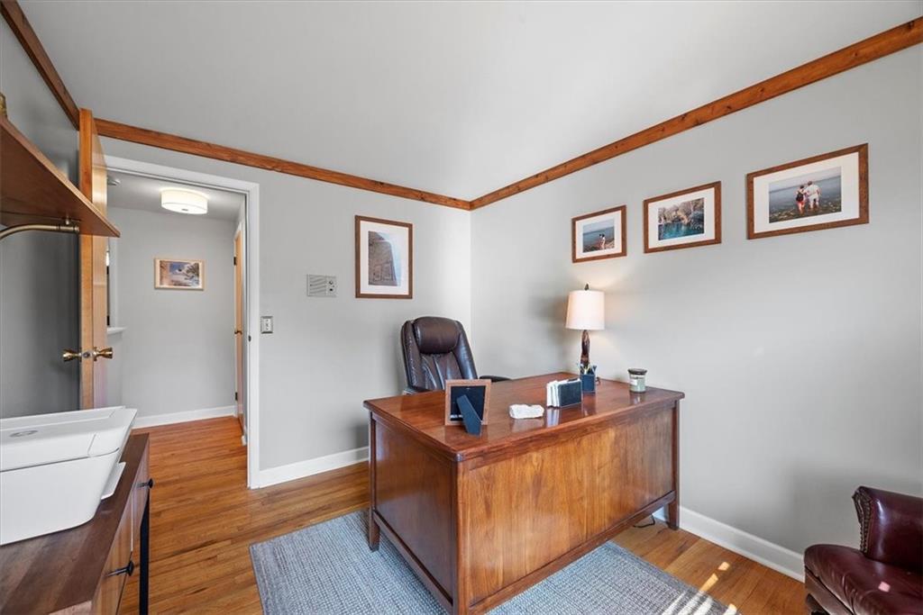505 Hudderford Road Pittsburgh, PA 15237 - Photo 27 of 43 a room with furniture and a wooden floor